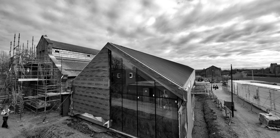 The new wings of the Engine Shed mostly constructed, with scaffolding up around one side of the building