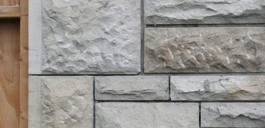Stone wall with neat fitting cuboid stone bricks