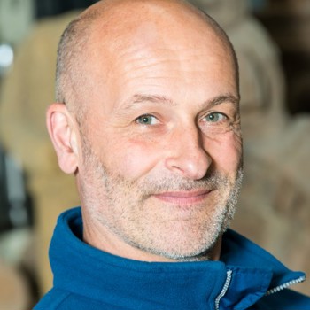 A headshot of Steven Gordon smiling