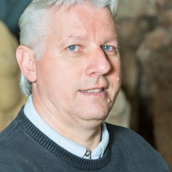 A headshot of Alan MacKenzie